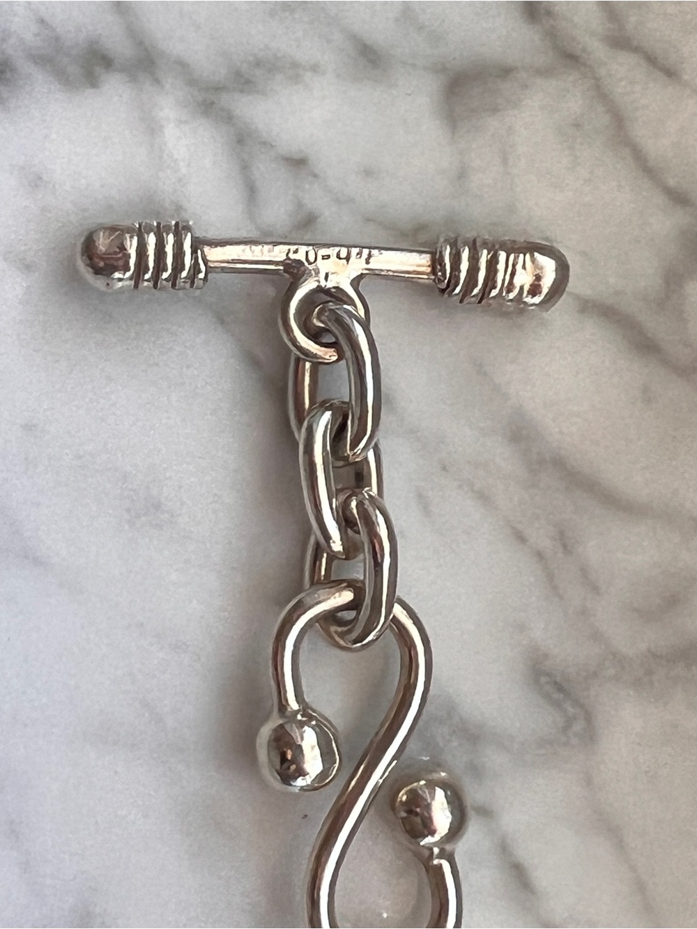 Silver 7.5 inch S-Shaped Solid Toggle Bracelet with Polished Ball Accents - Picture 4 of 11